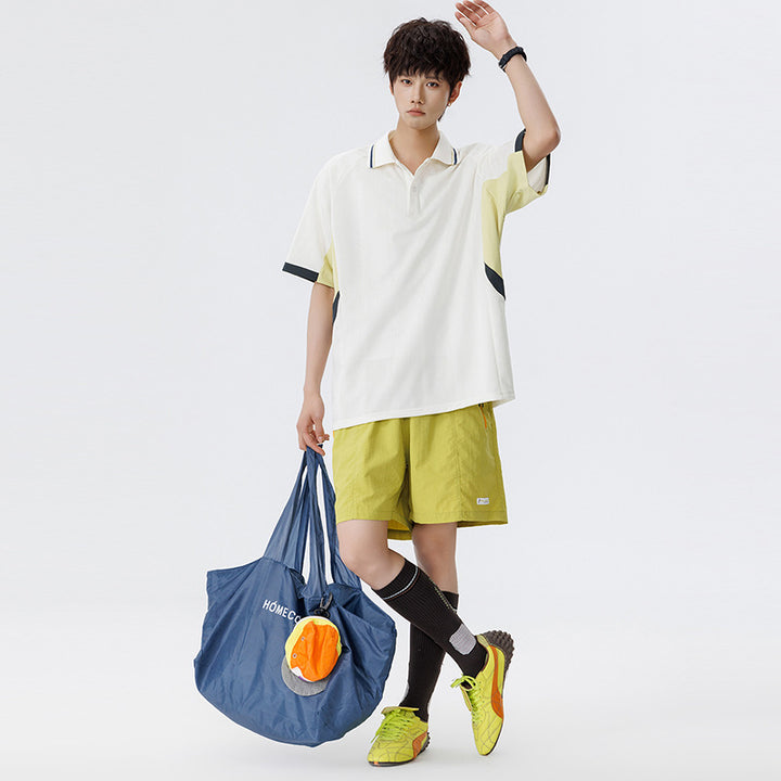 Unisex Boxy Oversize Polo Shirt made of technical functional jersey with contrast panels and raglan sleeves Drune