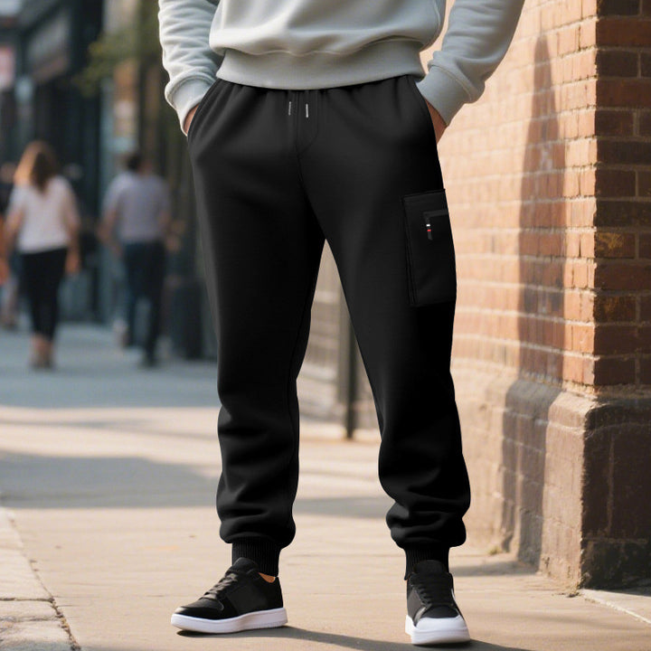 Men's casual joggers with cargo zip pocket, elastic waistband, and ribbed cuffs Mune Fashion