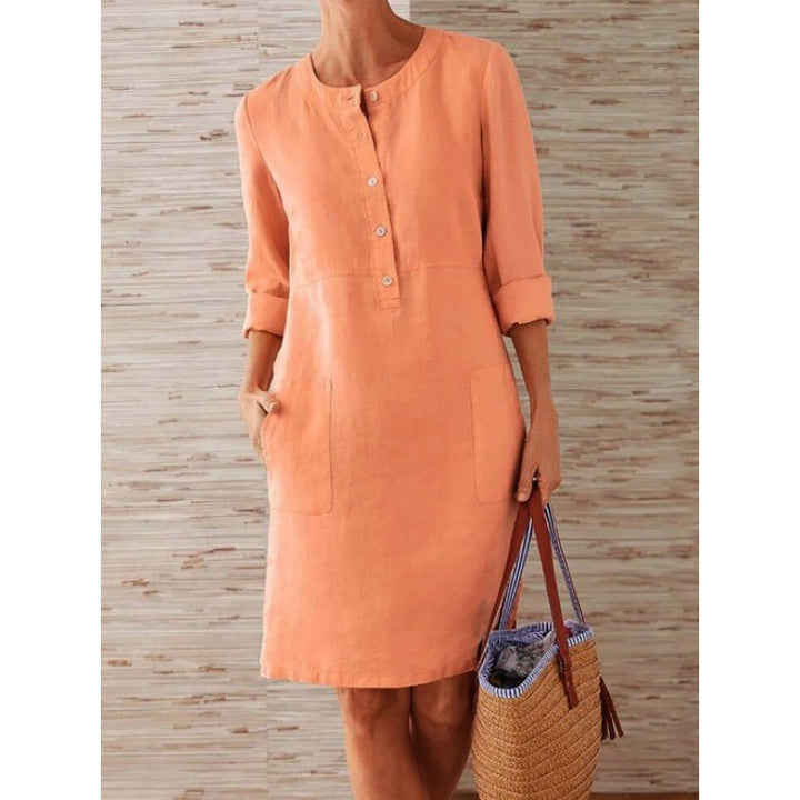 Women loose-fitting linen-look dress with three-quarter sleeves, button placket and side pockets Mune Fashion