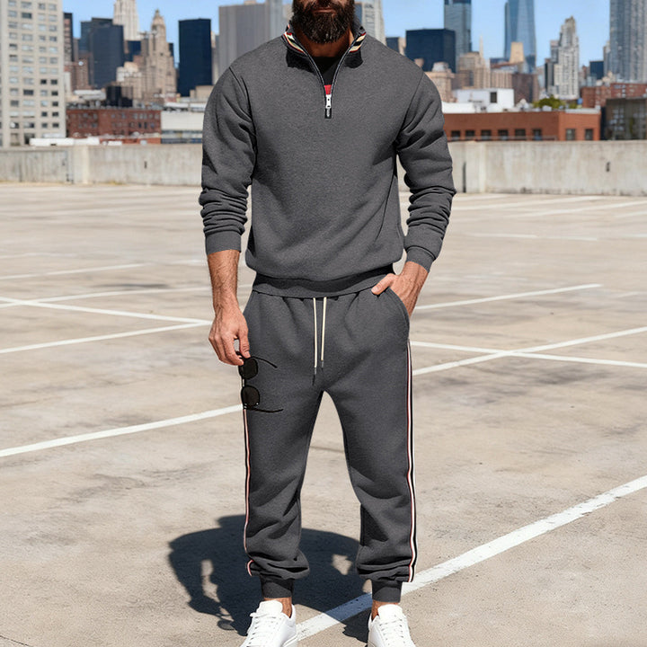 Men's stylish tracksuit set with half-zip, striped side stripes, and tapered jogger pants Mune Fashion