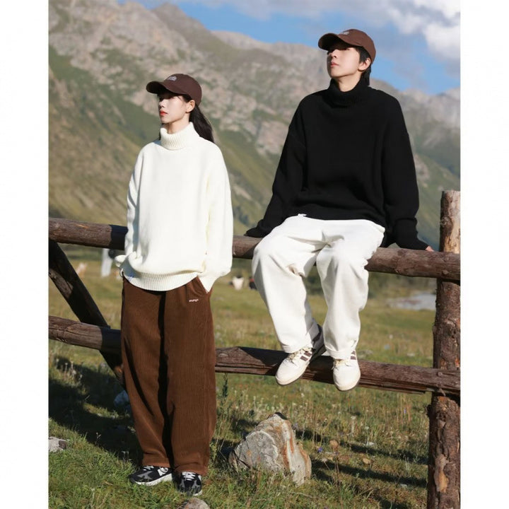 Women Oversized Turtleneck Sweater made of soft cotton blend with ribbed cuffs and extended hem Mune Fashion