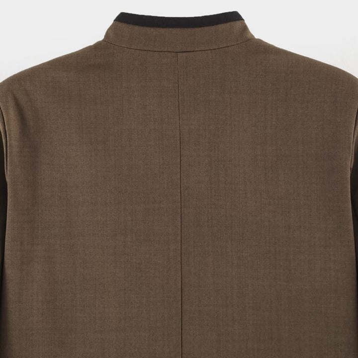 Women's short jacket in Mandarin style with decorative bow knots and contrast trim Mune Fashion