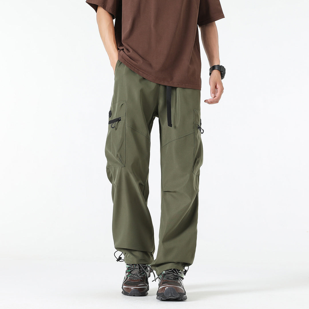 Men's wide technical cargo pants with multi pockets, drawstring and adjustable leg hems Drune