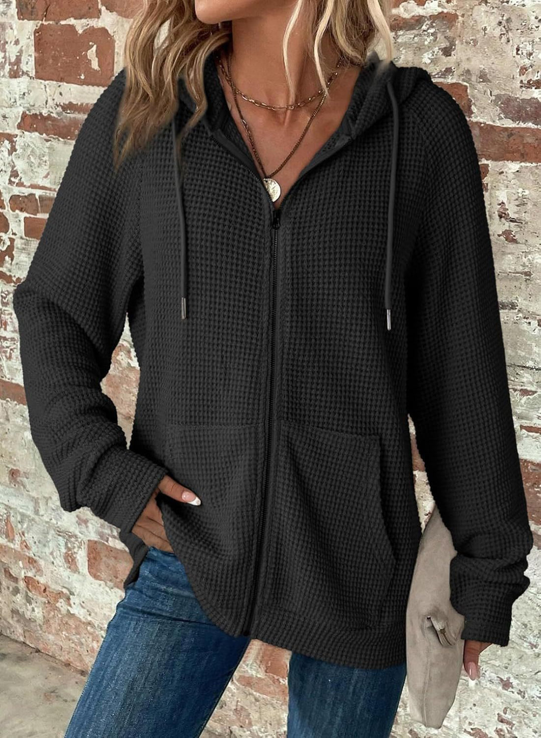 Women's waffle knit hooded jacket with zipper, kangaroo pockets, and relaxed silhouette Mune Fashion