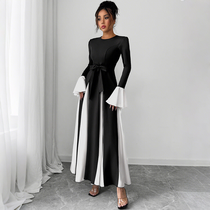 Ladies evening dress with fitted corset top, long sleeves and contrasting flounce cuffs Mune Fashion