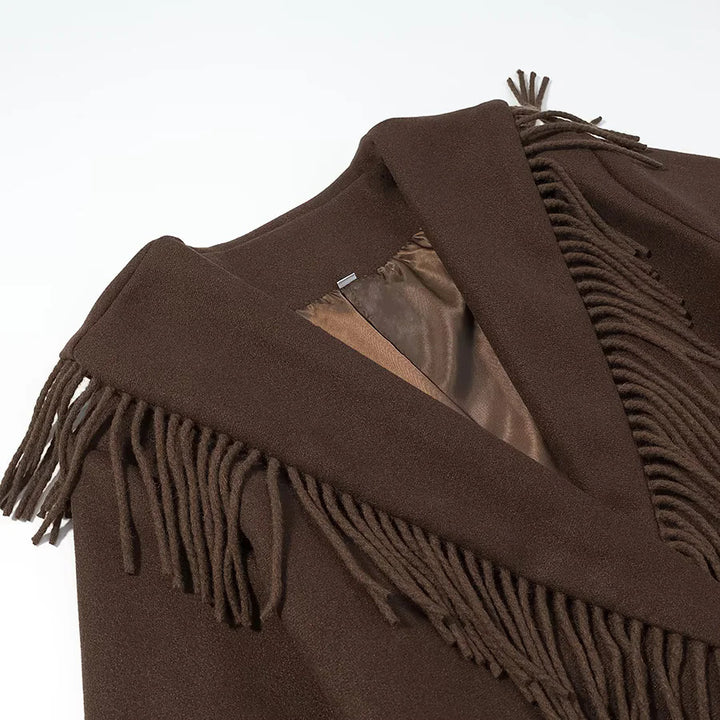 Ladies long fringed coat with voluminous shawl collar, waist belt and patch pockets Mune Fashion