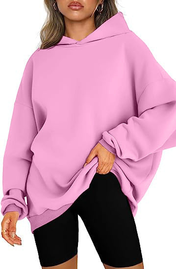 Women's oversized hoodie in longline cut with raglan sleeves and soft inner lining Mune Fashion