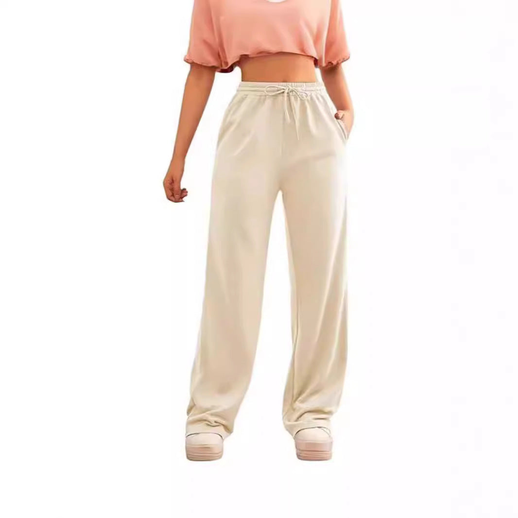 Women's flowing Relax palazzo pants with high comfort waistband, drawstring and side slip pockets Mune Fashion