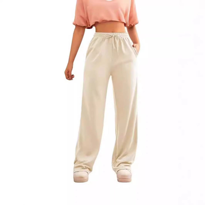 Women's flowing Relax palazzo pants with high comfort waistband, drawstring and side slip pockets Mune Fashion