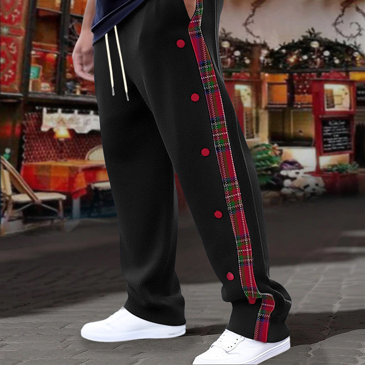 Men's casual jogging pants with checkered side piping, snap button placket, and ankle slits Mune Fashion
