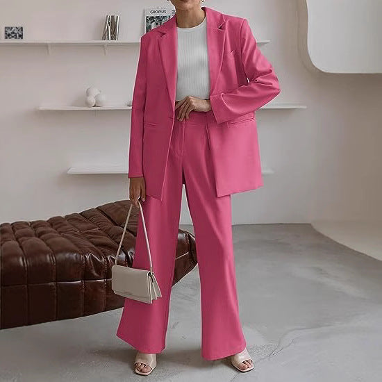 Women Long Blazer Set with boxy oversized silhouette, structured shoulder area and high-waisted palazzo pants Mune Fashion