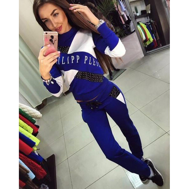 Women's sporty tracksuit set with studded detailing and color block design Mune Fashion