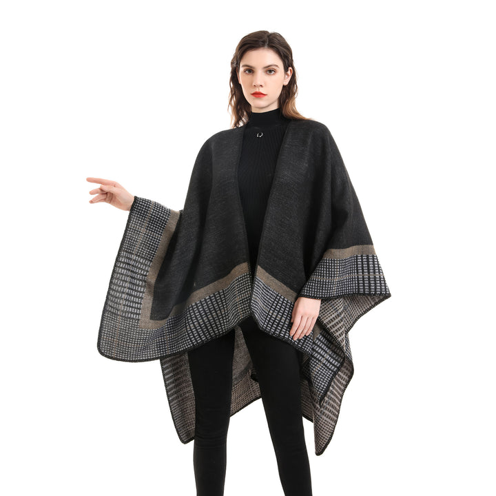 Women's wool blend poncho in asymmetric pointed cut with woven check border Mune Fashion