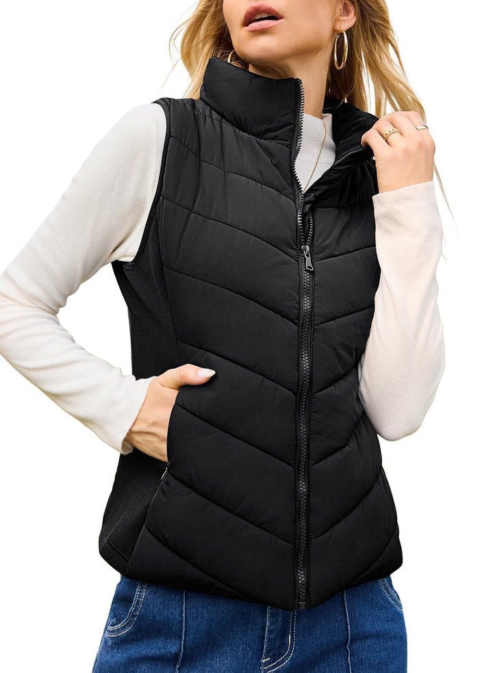 Women's quilted thermo vest with high stand-up collar and elastic side inserts Mune Fashion
