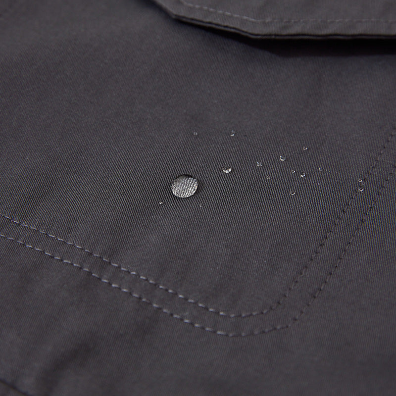 Unisex Boxy Overjacket with double-breasted button placket, large utility patch pockets and short boxy cut Mune Fashion