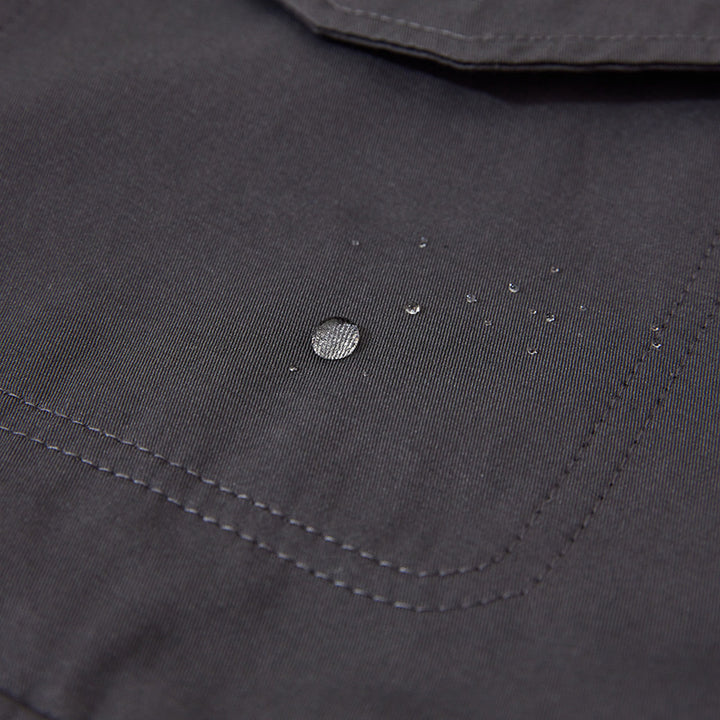 Unisex Boxy Overjacket with double-breasted button placket, large utility patch pockets and short boxy cut Mune Fashion