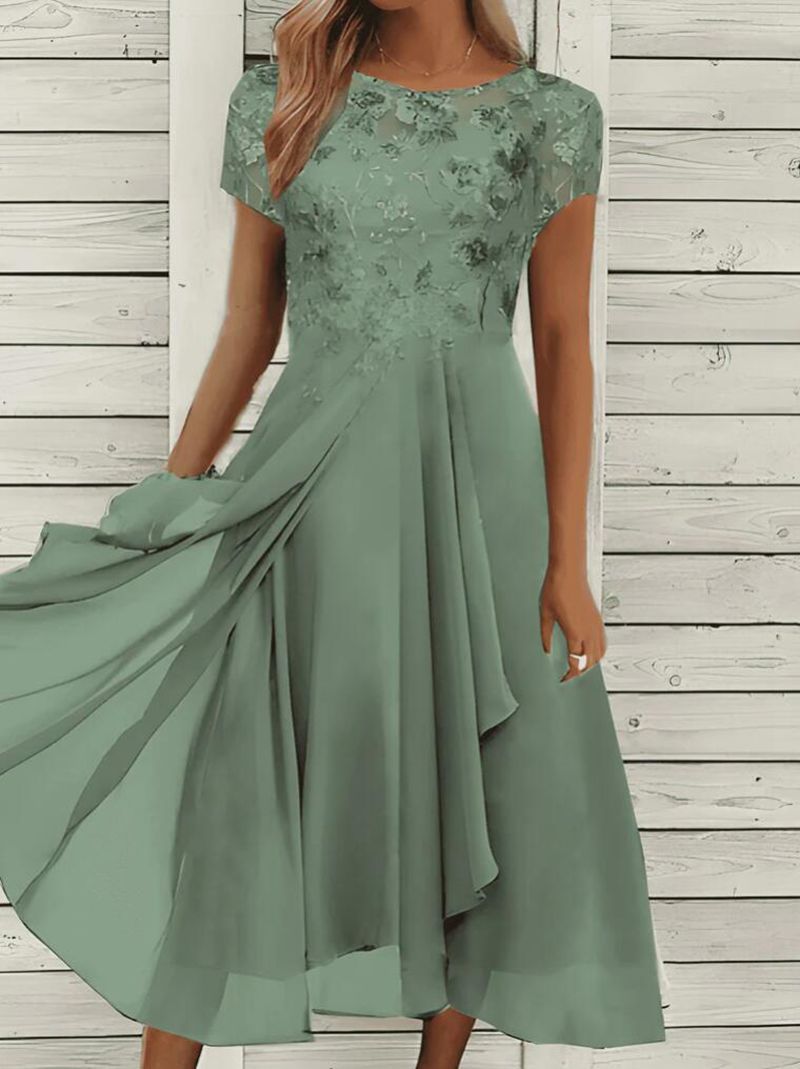 Women's flowing chiffon mid dress with floral embroidered top and asymmetrical tiered skirt Mune Fashion