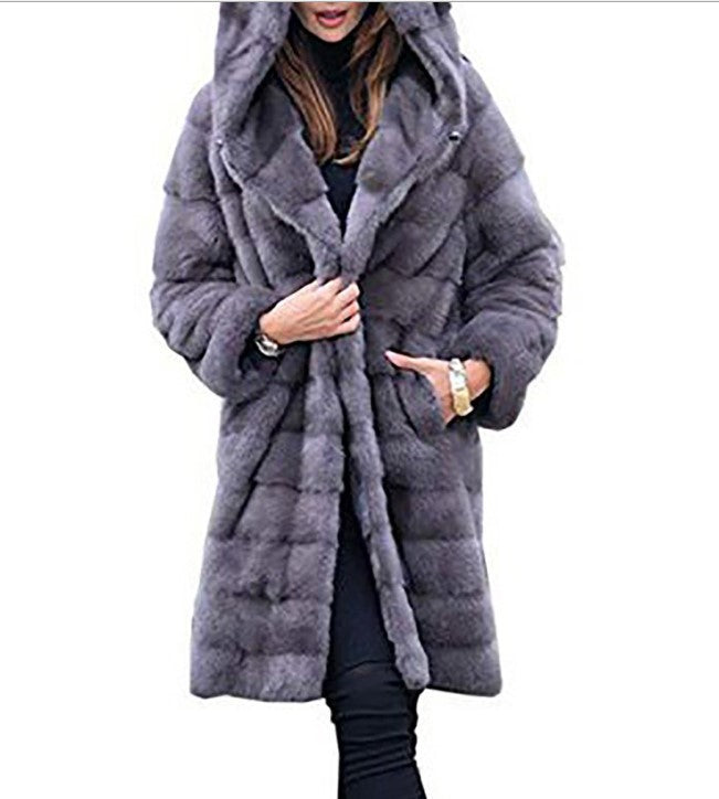 Women's oversized faux fur coat with hood and quilted panel design Mune Fashion