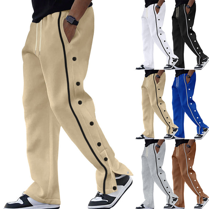 Men's Nan sporty jogging pants with side snap button placket, elastic drawstring waistband, and striking side stripes Mune Fashion