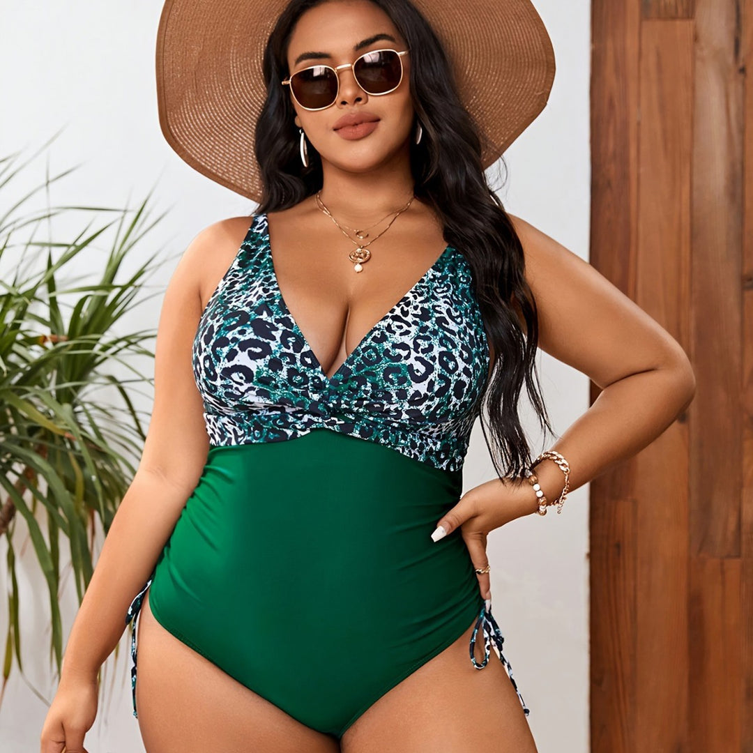 Women's one-piece swimsuit with deep V-neck and playful ruffle details Mune Fashion