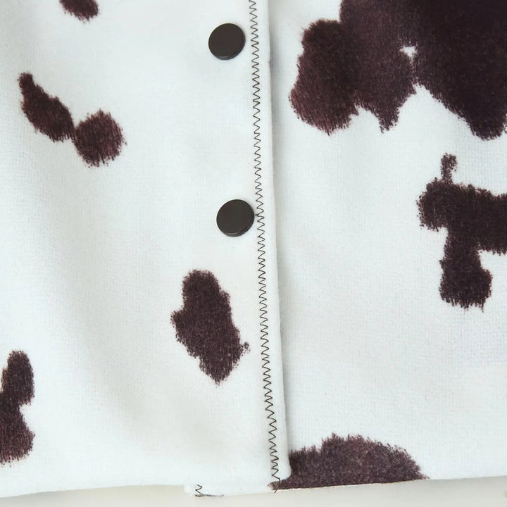 Women's cropped shirt jacket with cow print pattern and snap button closure Mune Fashion
