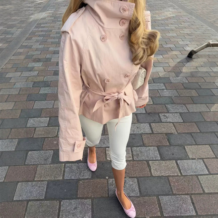 Women's short double-breasted trench coat with high standing collar, shoulder flaps and tie belt Mune Fashion