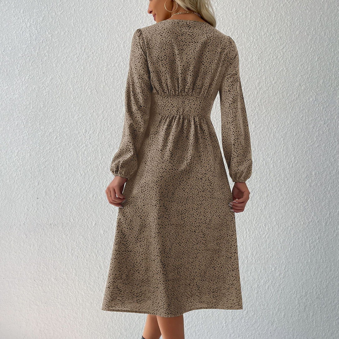 Women's V-neck midi dress with button placket, tailored fit and balloon sleeves Mune Fashion