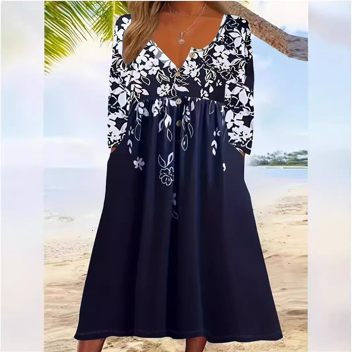 Ladies maxi dress with V-neck, floral print, button placket and side pockets Mune Fashion
