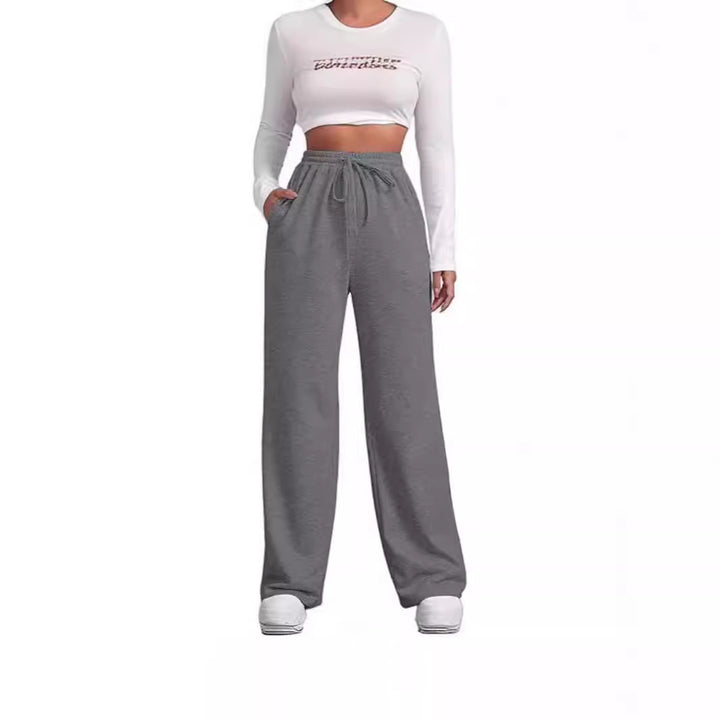 Women's flowing Relax palazzo pants with high comfort waistband, drawstring and side slip pockets Mune Fashion