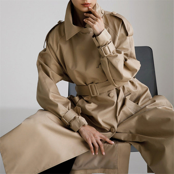 Women's Oversized Trench Coat with Wide Back Hem, Ties Belt and Storm Detail Mune Fashion