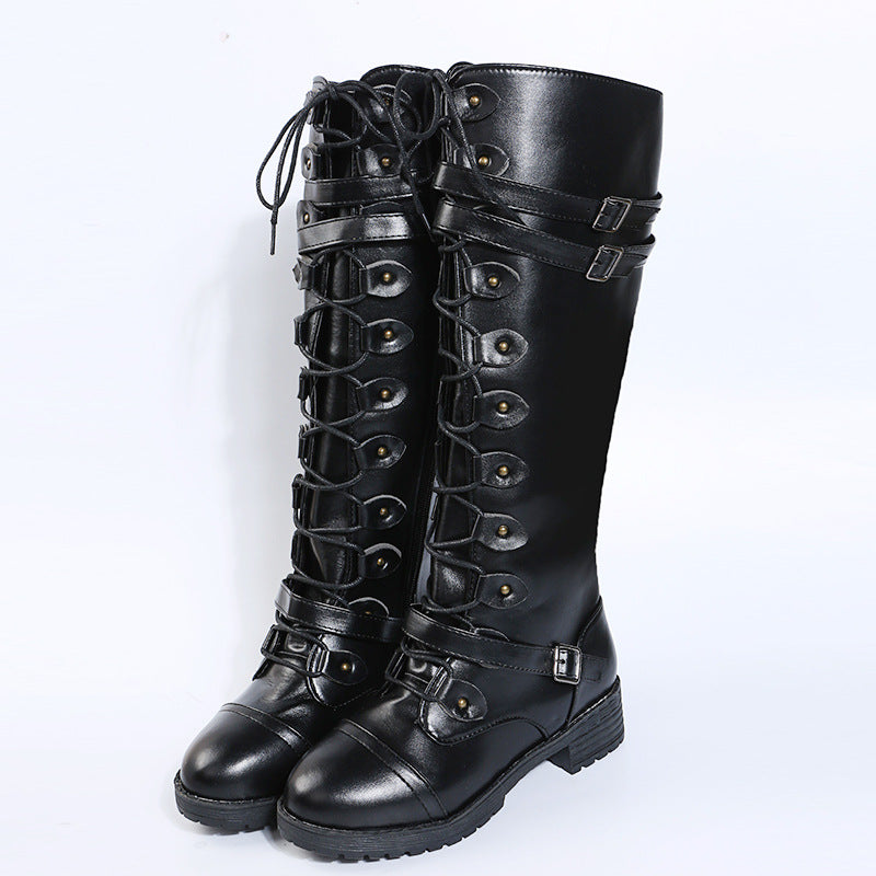 Women knee-high lace-up boots with side zipper, adjustable decorative straps and patterned rubber sole Mune Fashion