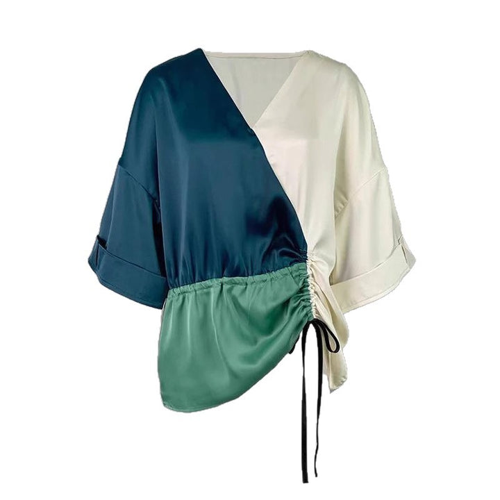 Women's blouse with V-neckline and side gathering cord