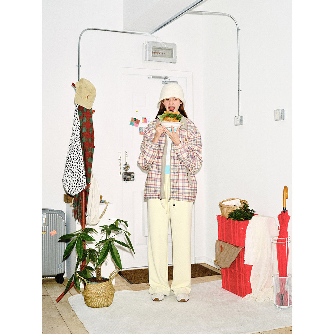 Women's lightly padded checkered boxy bomber jacket with drawstring hem, wooden bead cord and patch pockets Mune Fashion