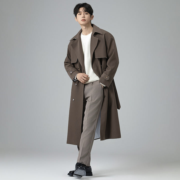 Men's trench coat in minimalist double-breasted design with wide shawl collar and waist belt Mune Fashion