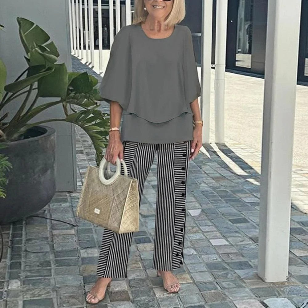 Women's layered tunic with cape sleeves and ankle-length straight leg pants with graphic print Mune Fashion