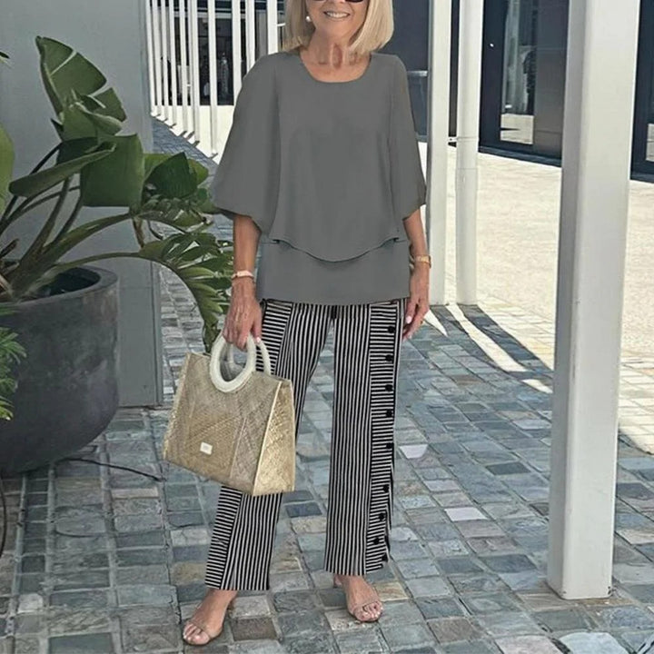 Women's layered tunic with cape sleeves and ankle-length straight leg pants with graphic print Mune Fashion