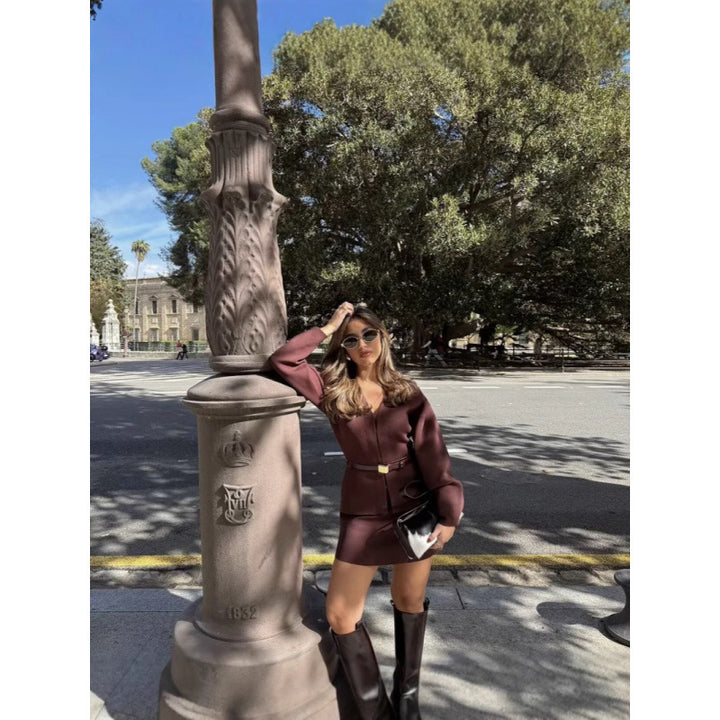 Women loosely fitted fine knit cardigan with deep V-neck and concealed button placket Mune Fashion