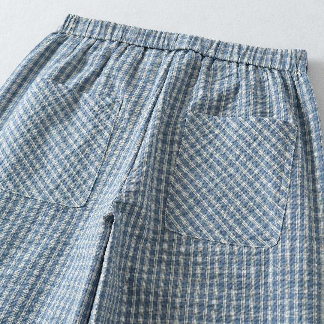 Women's wide high palazzo pants with elastic waistband and button placket Mune Fashion