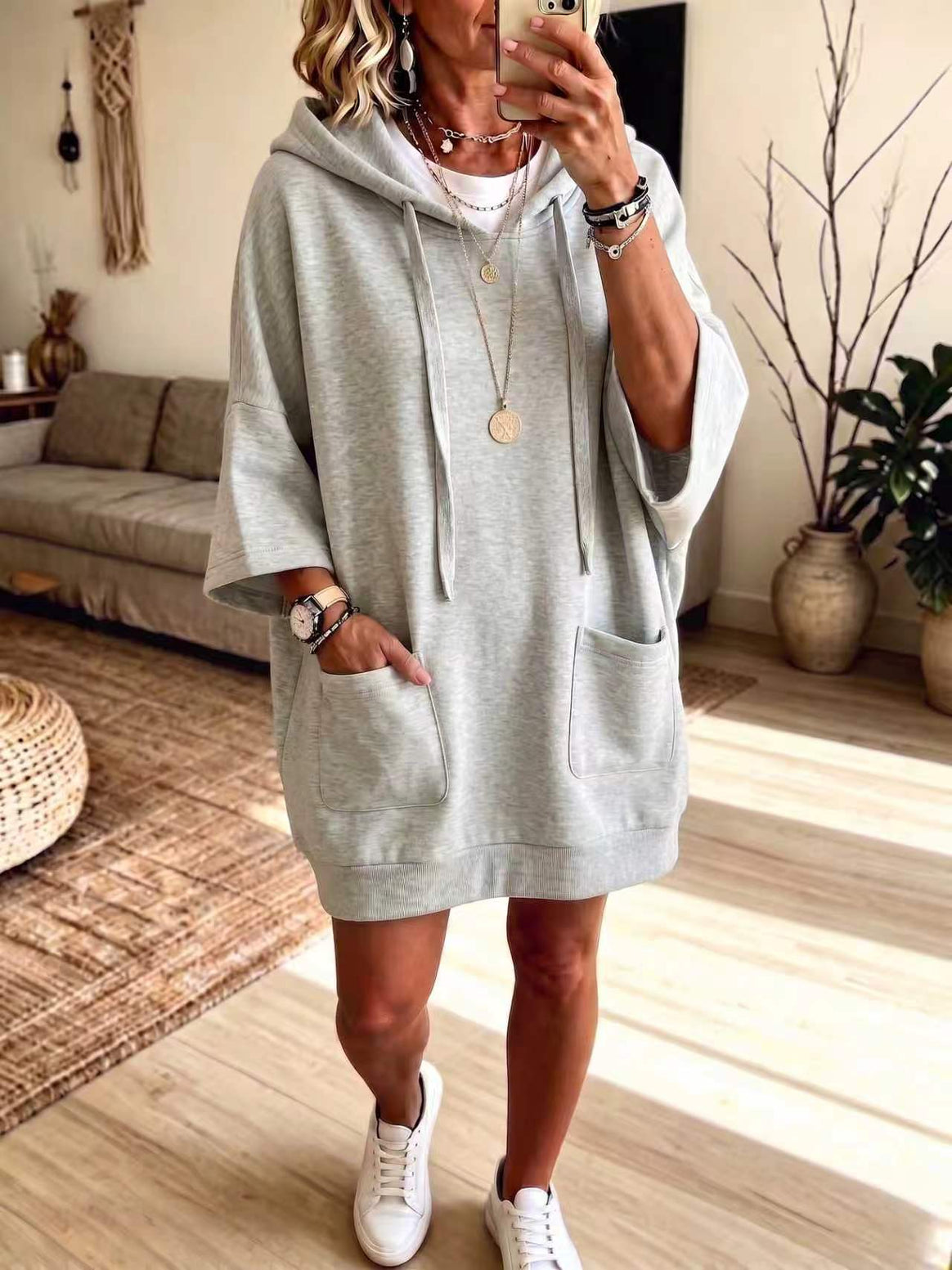 Women's Oversize Hoodie Dress with Kangaroo Pockets and Half-Length Sleeves Mune Fashion