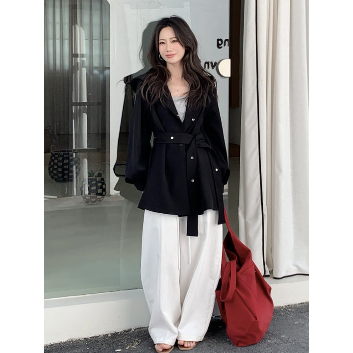Women's short-tailed coat with tie belt, balloon sleeves and decorative buttons Mune Fashion