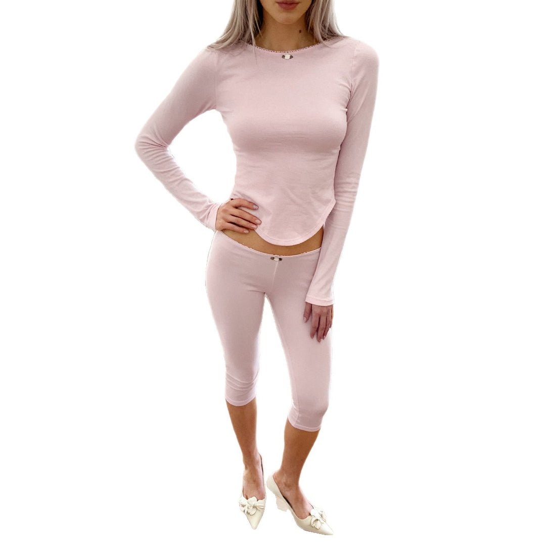 Women's tailored long-sleeve cropped top with curved hem and knee-length high-waist leggings made of stretch modal Mune Fashion