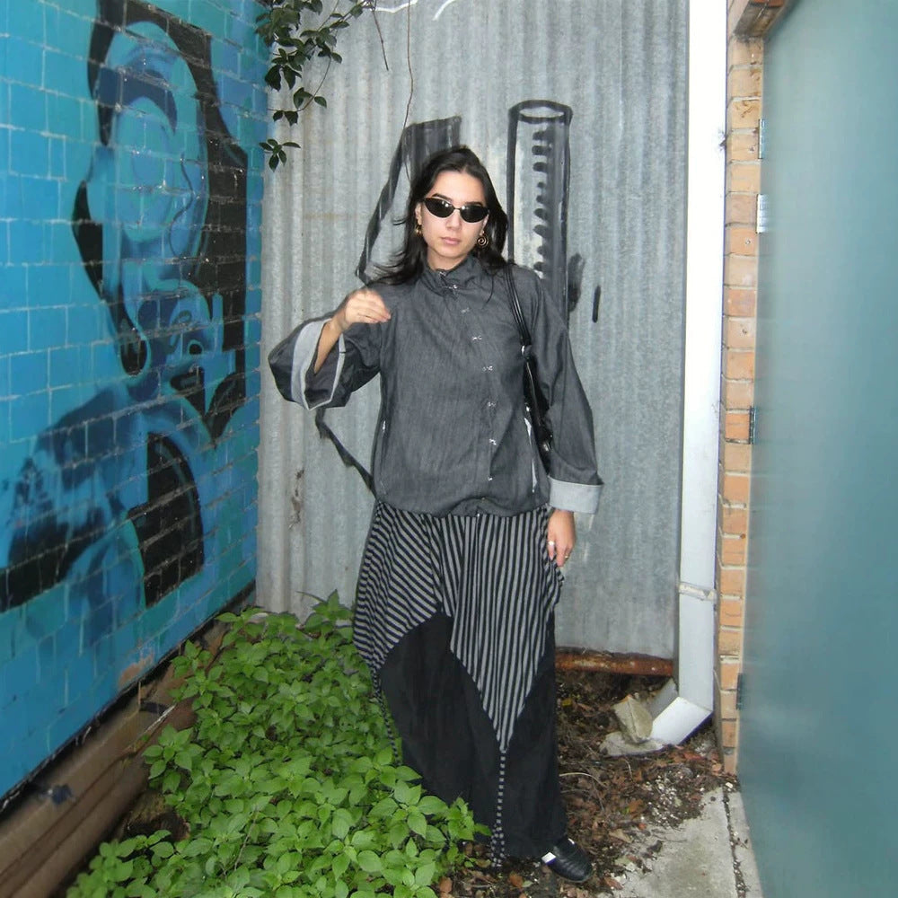 Women’s oversized boxy jacket with asymmetric button closure and arm pocket Mune Fashion