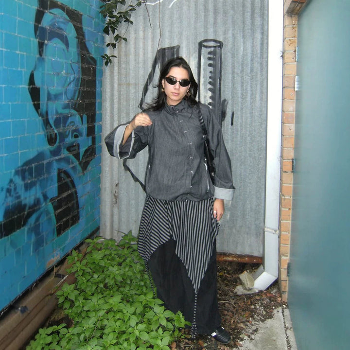 Women’s oversized boxy jacket with asymmetric button closure and arm pocket Mune Fashion