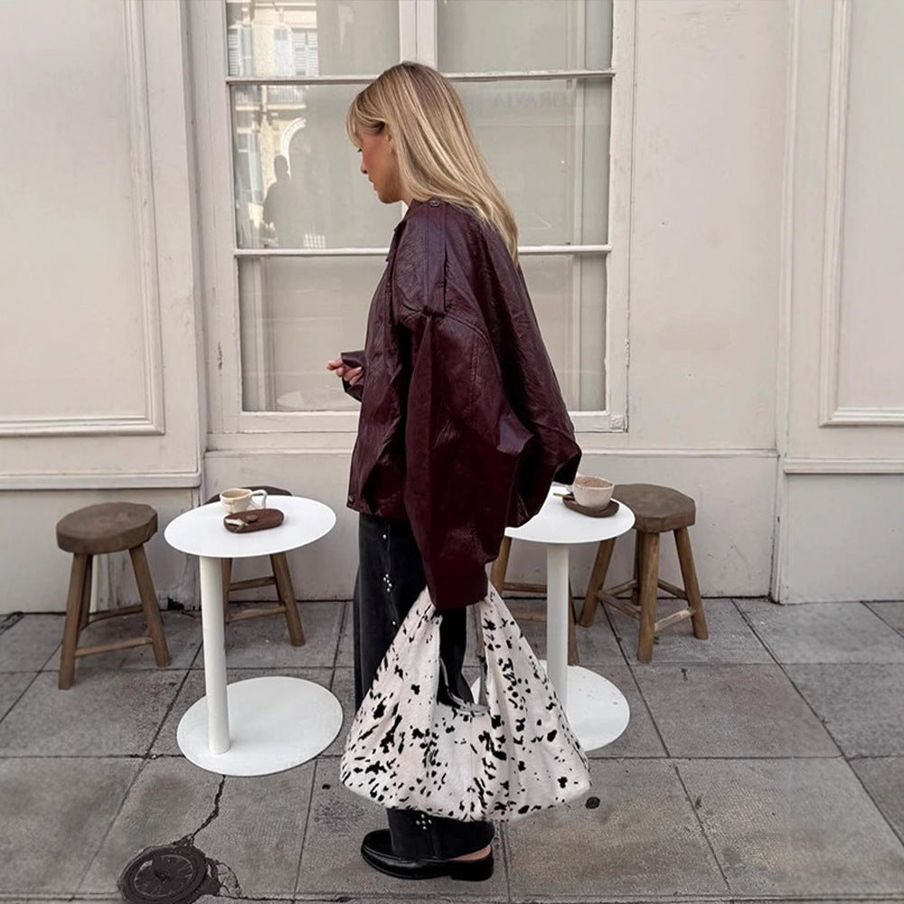 Women's short jacket in glossy patent look with boxy silhouette and dropped shoulders Mune Fashion