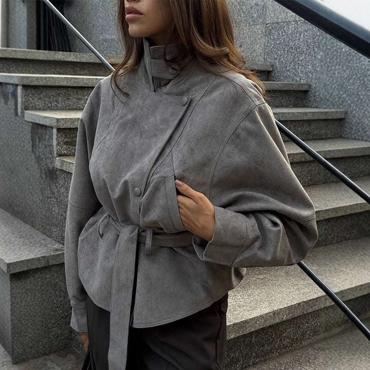 Women's short jacket made of faux suede with a high stand-up collar, waist belt, and boxy oversized silhouette Mune Fashion