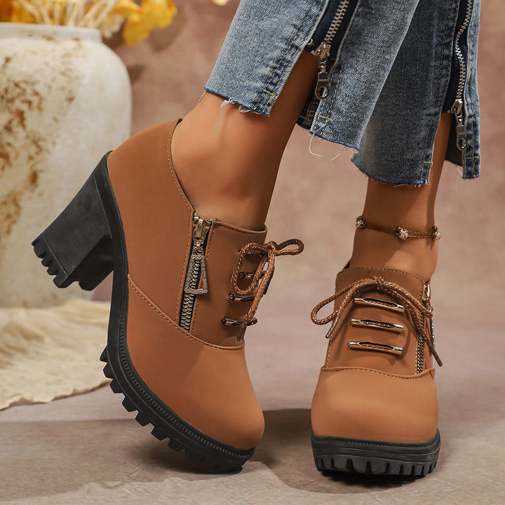 Women's elegant lace-up booties with sturdy block heel, side zipper, and decorative pendant Mune Fashion