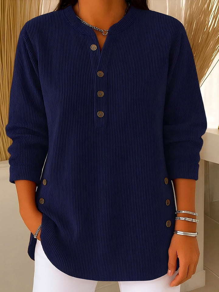Women's plisse tunic blouse with stand-up collar, button placket and side decorative buttons Mune Fashion