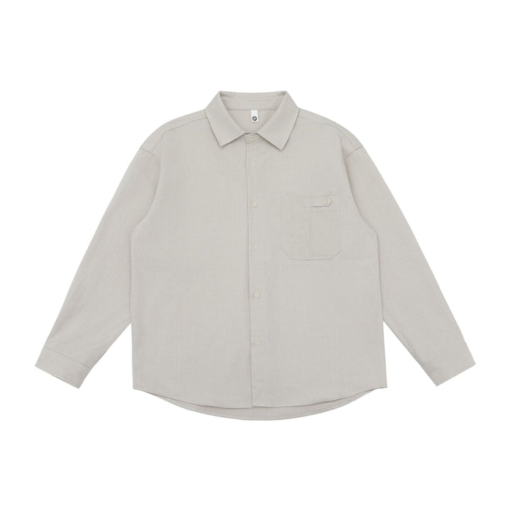 Unisex Oversize Shirt Jacket in a minimalist workwear style with rounded hem and chest flap pocket Mune Fashion