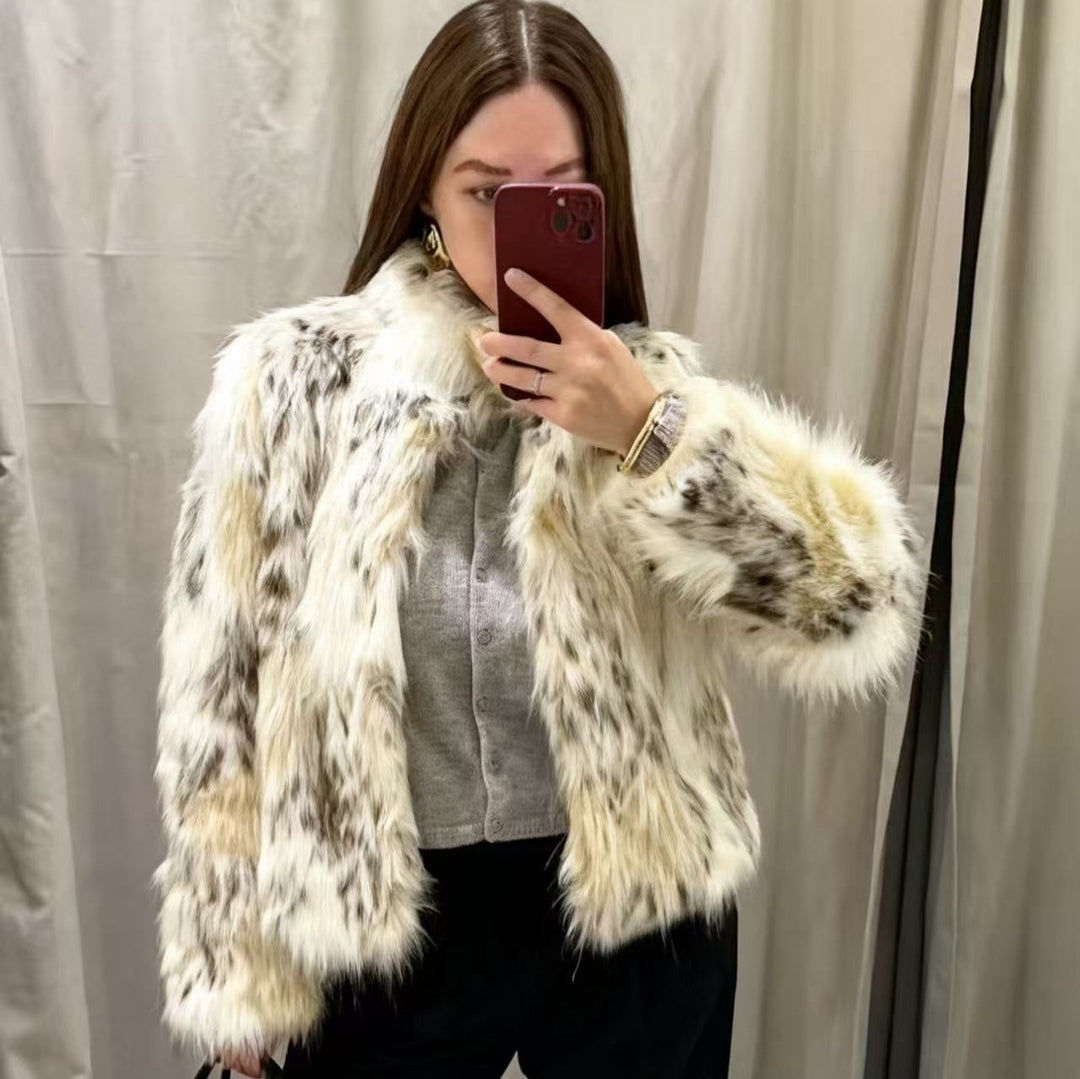 Women's short faux fur cropped jacket with stand-up collar, soft fibers and mottled texture Mune Fashion