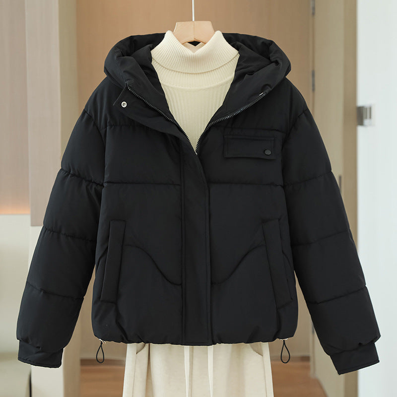 Women's short padded hooded jacket with concealed front placket, chest patch pocket and adjustable drawstring hem Mune Fashion